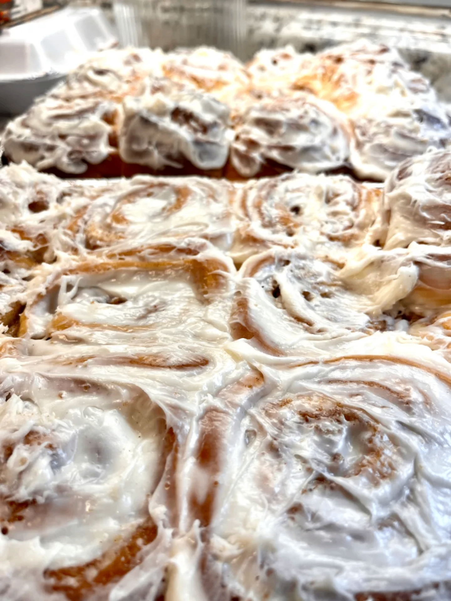 Finished cinnamon rolls with cream cheese frosting