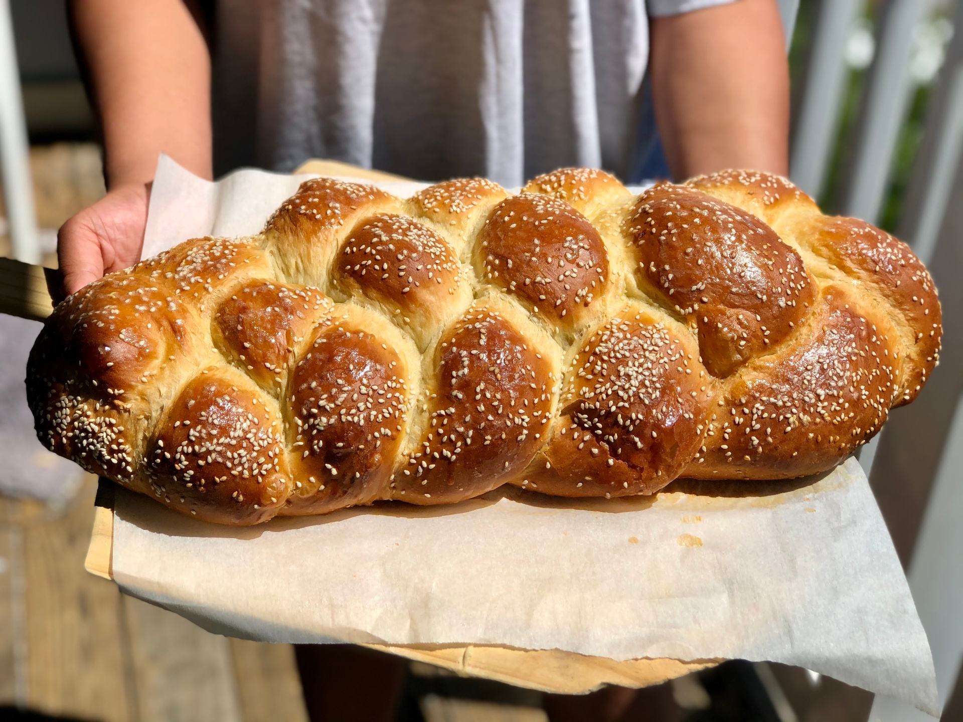 Beautiful braided challah with sesame seeds